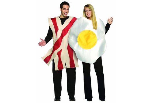 Couple dressed a slice of bacon and eggs.